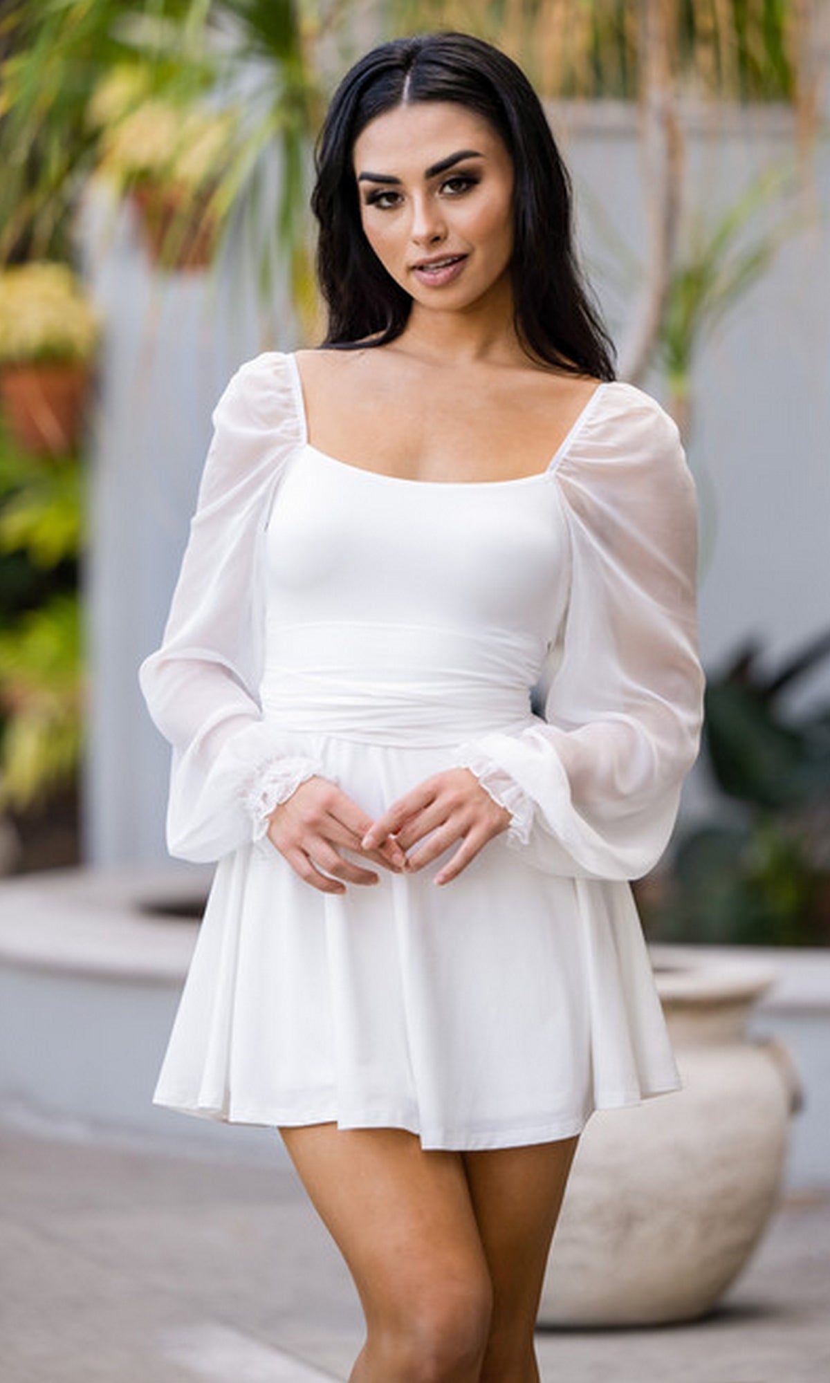 white cocktail dress with sleeves